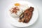 Fried Daing na Bangus with Garlic Fried Rice, Fried Egg, and Pickled Papaya Daing Silog