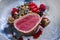 Fried dry aged angus beef filet medaillons natural with mushroom tartar, truffle cream and forest berries on a design bowl