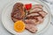 Fried duck breast with fresh orange and ginger, ready to eat food. Domestic cuisine, poultry meat