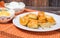 Fried dumplings, sour cream and cheese sauce
