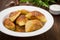 Fried dumplings. Wooden background. Top view