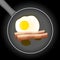 Fried egg and beacon in a frying pan with oil