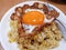 Fried Egg Duck on top with Fries Rice and Dried Chili. Top view see Rich and bold egg yolks.