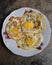 Fried egg. Eggs placed on a white plate. Selective focus.