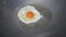 A fried egg with oil on pan./It`s breakfast in fewer than five minutes. It`s some extra oomph for your salad. It`s what turns a bo