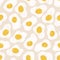 Fried egg pattern. Breakfast cute print - eggs with pepper seasoning on beige background.