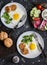 Fried eggs, chicken meatballs, vegetables, and yogurt sauce on a dark background. Healthy lunch