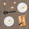 Fried eggs cooked breakfast food on two plates on table vector illustration.
