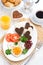 Fried eggs in the form of heart for breakfast Valentine\'s Day