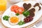 fried eggs in the form of heart for breakfast Valentine\'s Day