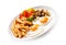 Fried eggs, French fries and vegetables