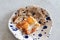 Fried eggs with sesame, served with sour dough toast