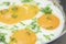 Fried Eggs. Sunny side up or fried eggs. Classic ingredients and garnishes used in restaurant cooking.
