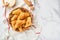 Fried empanadas with cilantro, meat, egg, tomato and chili sauce on white background. Latin American and Chilean independence day