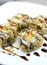 Fried exquisite sushi rolls with sweet sauce