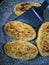 Fried fish cakes in a pan close-up. Take the cutlet from the pan a kitchen plastic spatula.