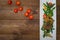 Fried fish with pea pods and cherry tomatoes.. Wooden background. Top view. Close-up