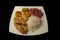 Fried fish with rice on a plate
