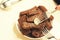 Fried garlic croutons, black bread on a white plate