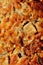 Fried greasy potato pancake texture. Close-up. Vertical photo.