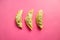 Fried mandu filled with beef, pork and shrimps on pink background. Korean cuisine