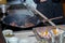 Fried meat in a frying pan closeup. Meat in a pan fry - making food