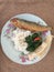 Fried milkfish with swamp cabbage and rambak crackers