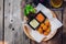 Fried Mozzarella Cheese Balls served with mayonnaise and thousand island sauce in wooden bowl