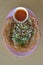 Fried oyster omelette with chili sauce on small mini saucer