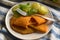Fried panzerotti filled with tomato sauce and cheese - Italian Food