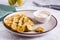 Fried pickles and sauce on a plate. American snack