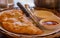 Fried pie with meat and sauces. Hot homemade empanada. Tasty patty. Traditional ukrainian food.