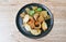 fried pork skin with slice fish line and carrot on plate