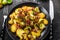 Fried potatoes with Brussels sprouts and bacon