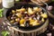 Fried potatoes with forest mushrooms, boletus, onions and sour cream. Rustic dish in frying pan, vegetarian autumn food on dark