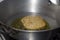 Fried Puri in a frying pan. very popular street food in India.famous indian food, Selective focus on subject