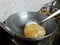 Fried Puri in a frying pan. very popular street food in India.famous indian food, Selective focus on subject