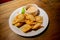 Fried ravioli stuffed with chicken and scallions