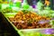 Fried red palm weevil with salt and pepper on a food stall