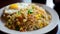 Fried Rice - A popular and versatile dish made with stir-fried rice, vegetables, and often meat or seafood, seasoned with sauces