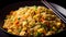 Fried Rice - A popular and versatile dish made with stir-fried rice, vegetables, and often meat or seafood, seasoned with sauces