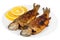 Fried river trout fish on plate