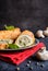 Fried rolls coated in batter and stuffed with mushroom, cheese, onion and parsley