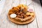 Fried salty appetizer platter on a wooden board