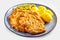 Fried schnitzel with boiled potatoes