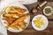 Fried smelt in a white plate. Small fish