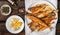 Fried smelt in a white plate. Small fish