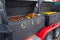 Fried smoked sausages, fried chicken wings, peppers and paprika, toasted corn on fire, street food, mobile barbecue