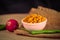Fried and Spicy Chana Dal Masala is a popular Chakna recipe.masala chana dal on white plastic bowl on wooden
