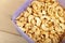 Fried splited cashews on a wooden table